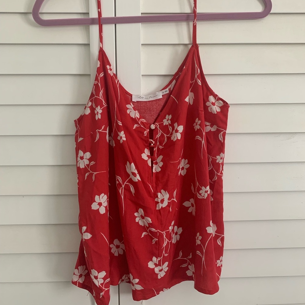Summery red blouse with white flowers
